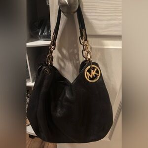 Michael Kors black leather large purse.